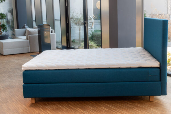 Boxspringbett Deluxe türkis Seitenansicht